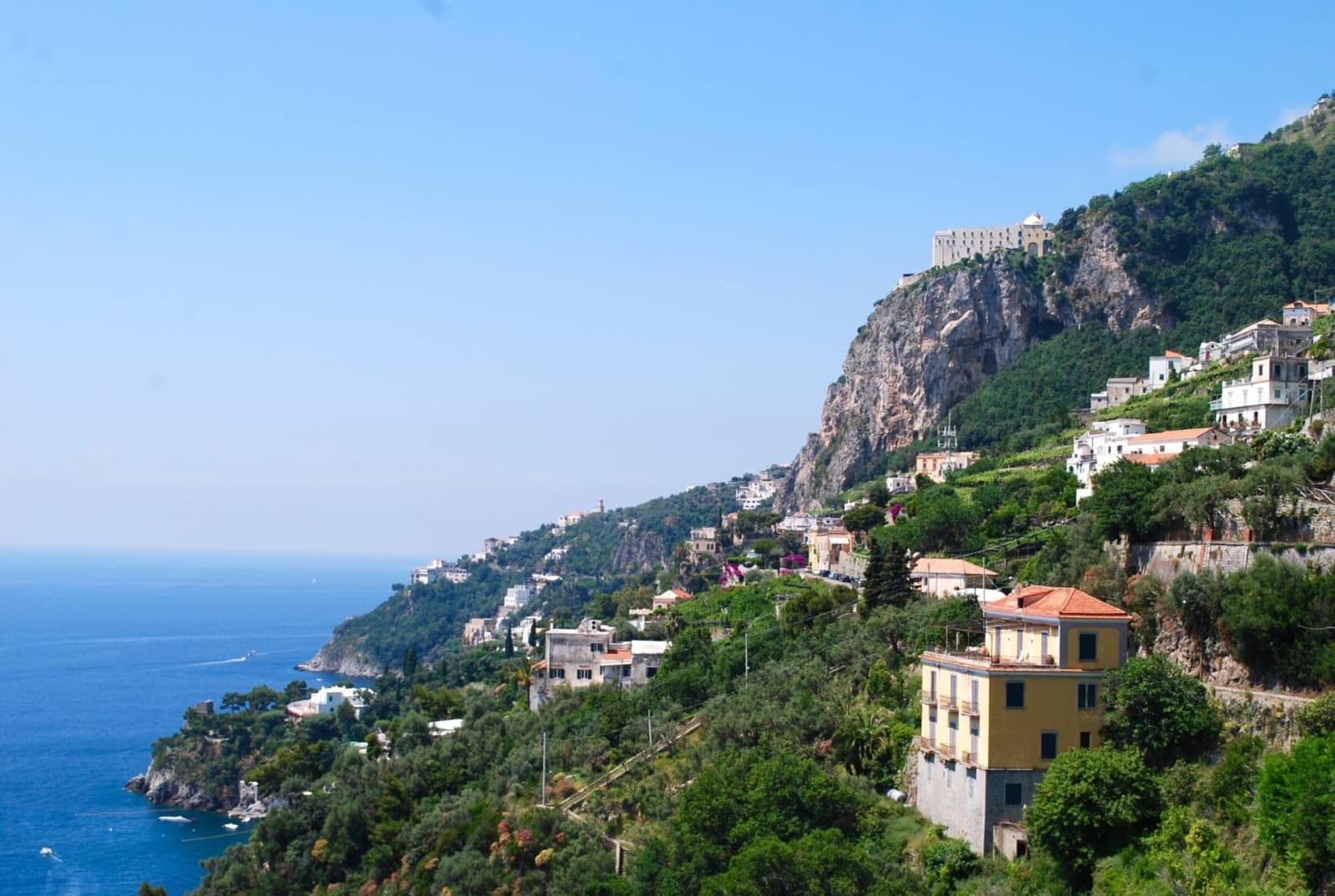 Monastero Santa Rosa is the white building on the right side of the photo