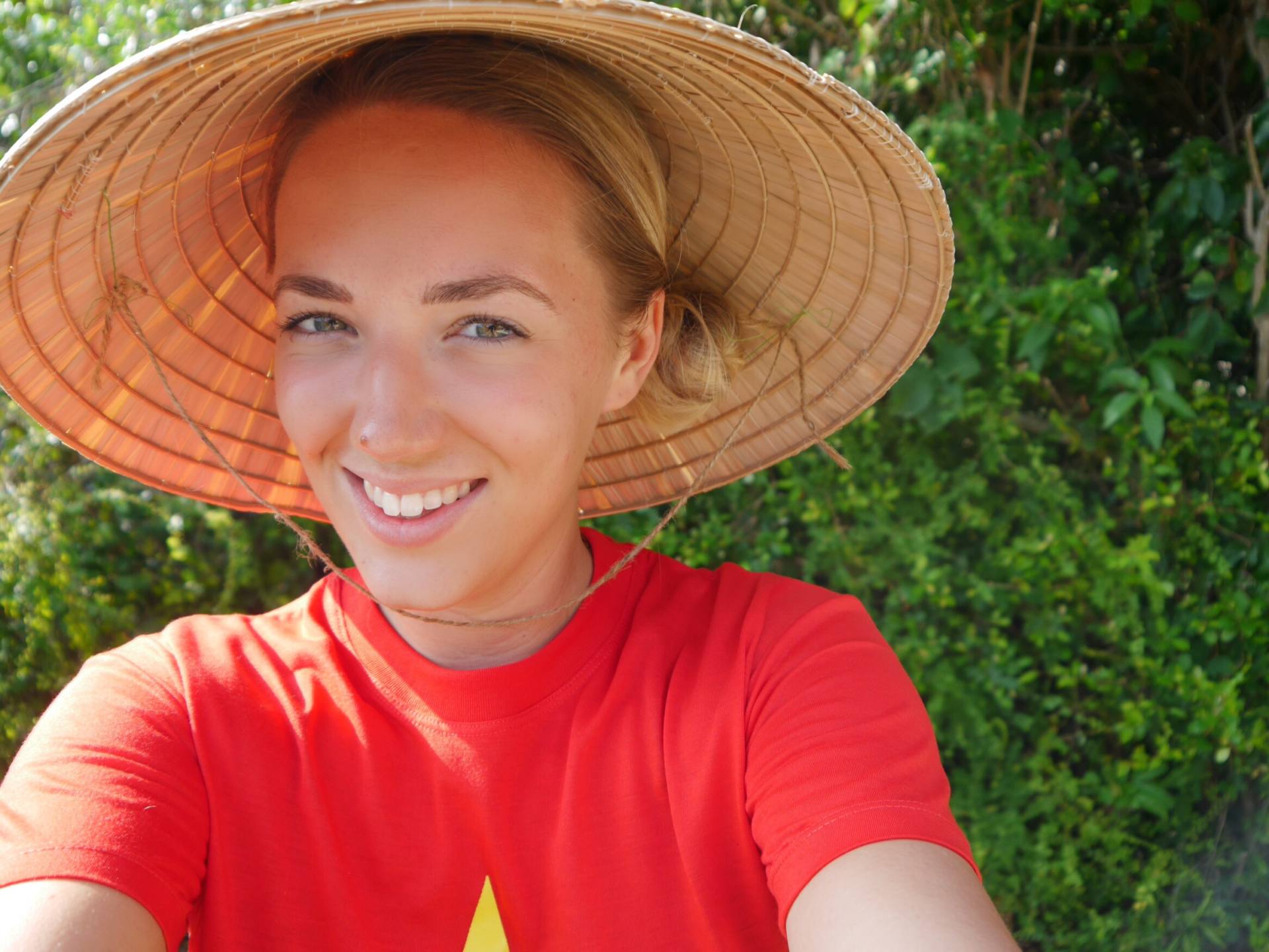 Things to know before visiting Vietnam. Selfie with Vietnamese hat