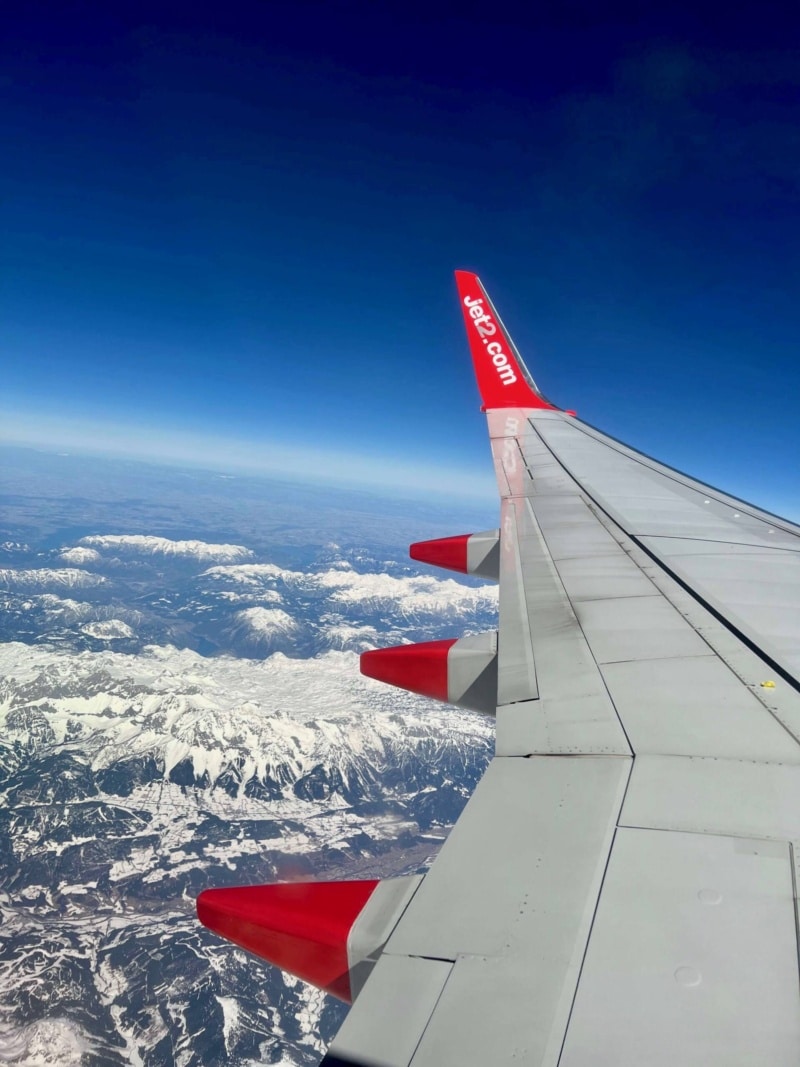 Jet2 plane wing with clouds